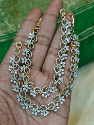 Flower tilak american diamond ear chain