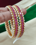 Ruby with pearl bangle