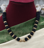 Black rope with antique gold balls