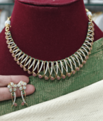 Kanti necklace set with a white stone and ruby combination