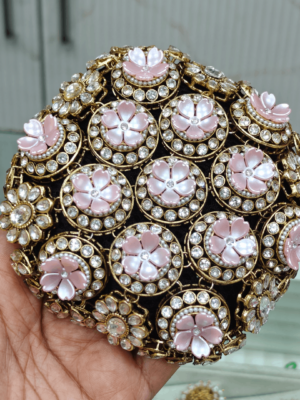 Pink flower in kundan circle hair buncage
