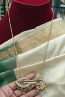 Veena pendent with the plain chain