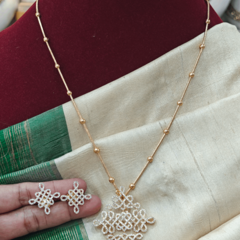 Kolam pendant with ball chain
