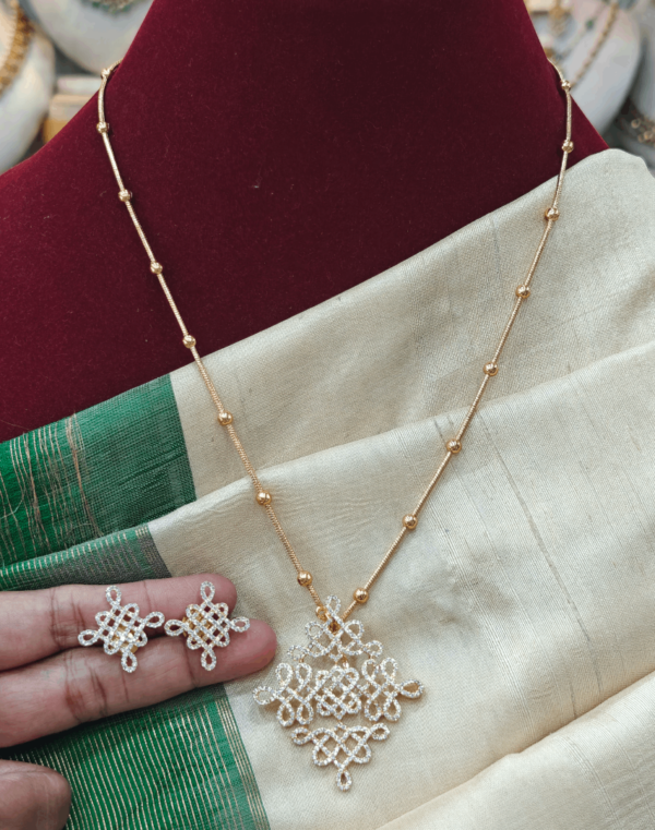 Kolam pendant with ball chain