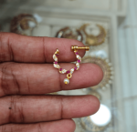 Ruby and white screw nose ring