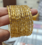 Golden rain drop glass bangles
