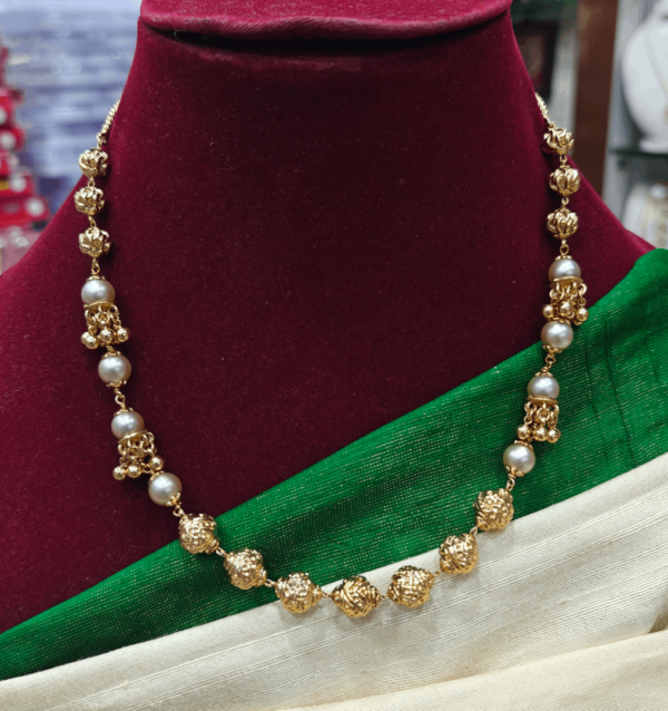 Gold balls with gungurus mala