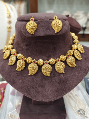 Mango with gold ball`s choker