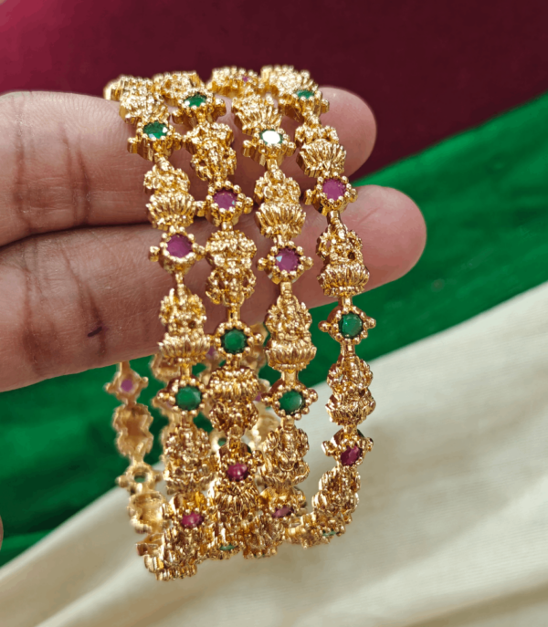 Lakshmi with green and ruby stone bangles