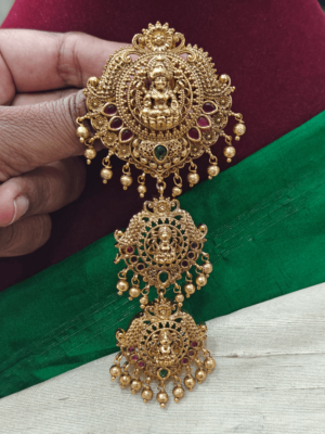 Trilakshmi with gold balls hair accessory