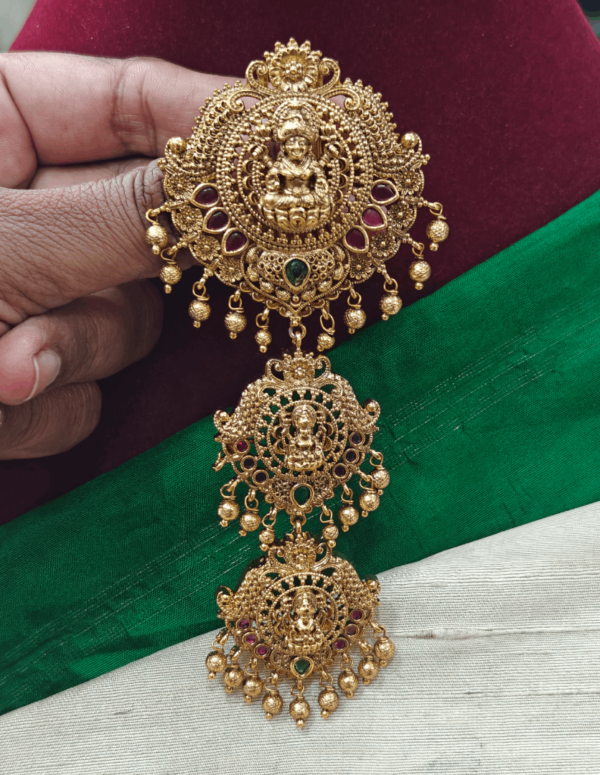 Trilakshmi with gold balls hair accessory