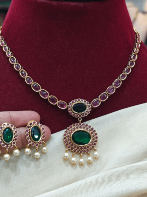 Ruby necklace with the simple green  pendant