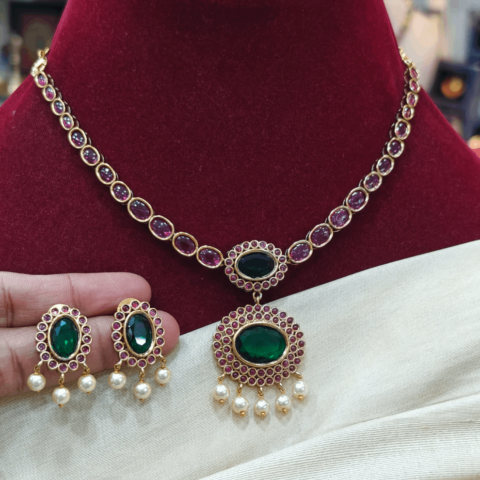 Ruby necklace with the simple green  pendant