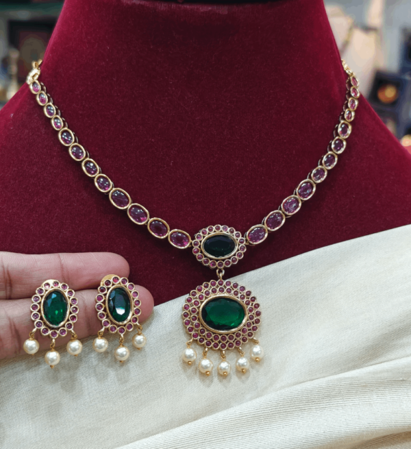 Ruby necklace with the simple green  pendant